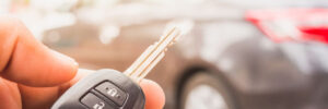 Man unlocking car with his backup set of car keys