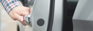 Locksmith opening door after getting unlocked for a customer.