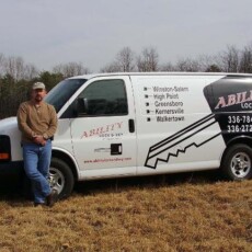 Jeff Hudgins standing next to Ability Lock & Key van